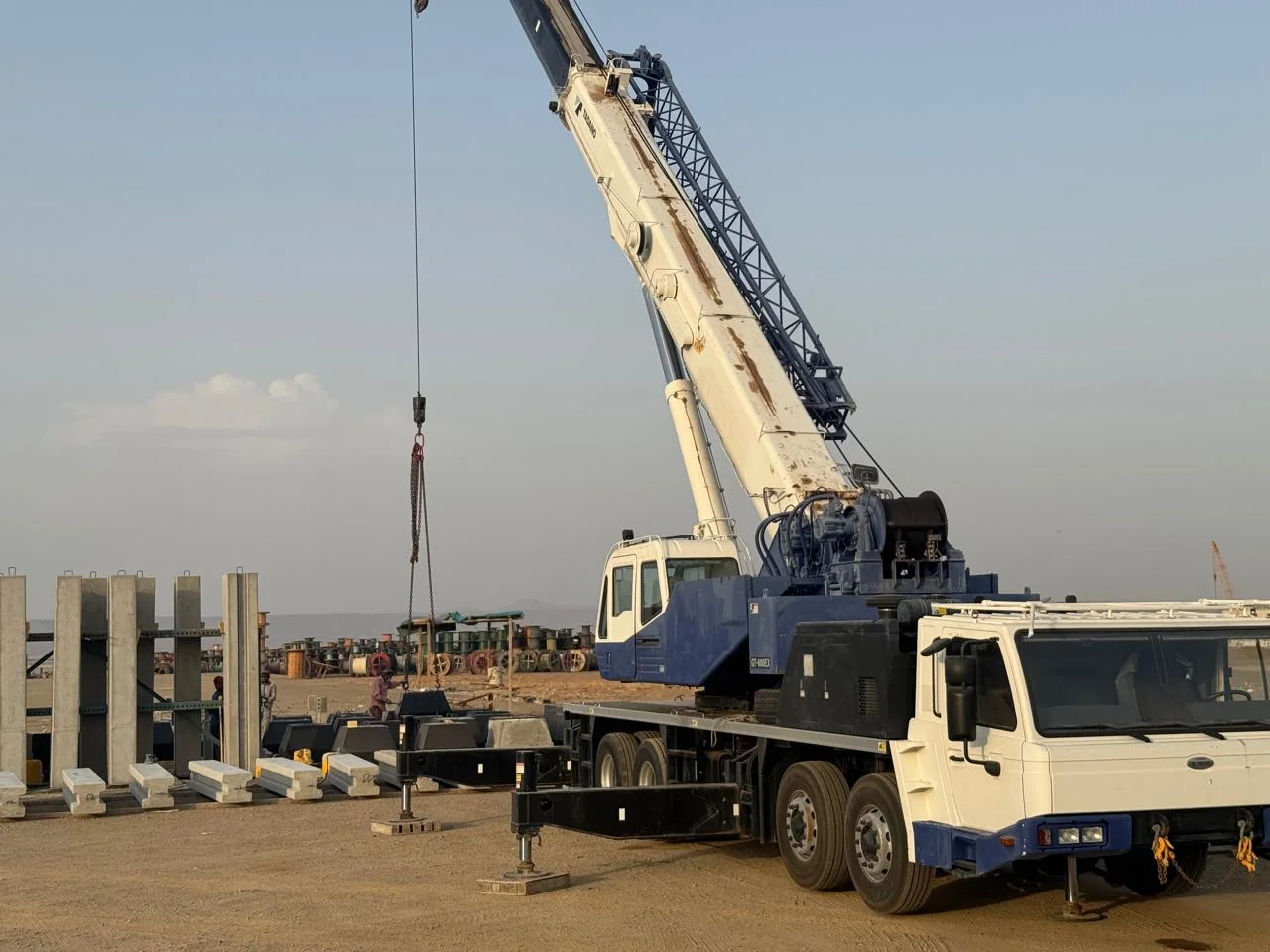 Crane working in an industrial yard