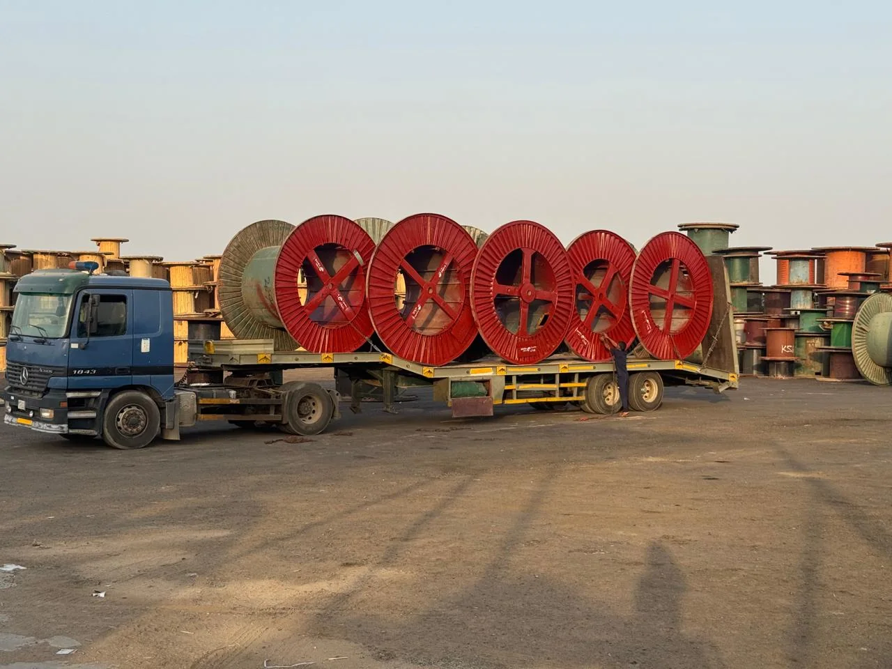 Cable drums loaded on transport trailer